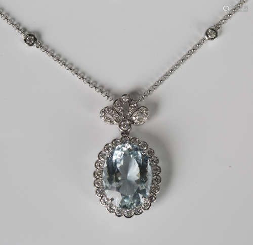 A white gold, aquamarine and diamond pendant necklace, claw ...