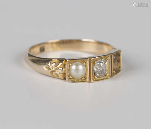 A Victorian gold ring, mounted with a cushion cut diamond in...