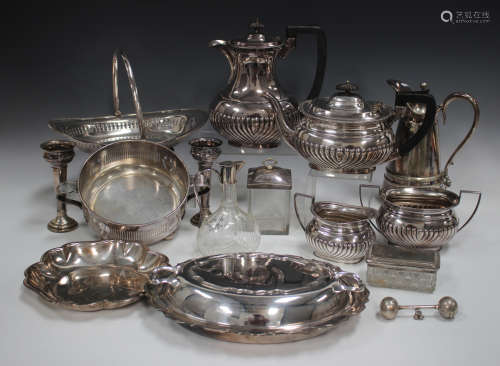 A collection of assorted plated items, including a four-piec...