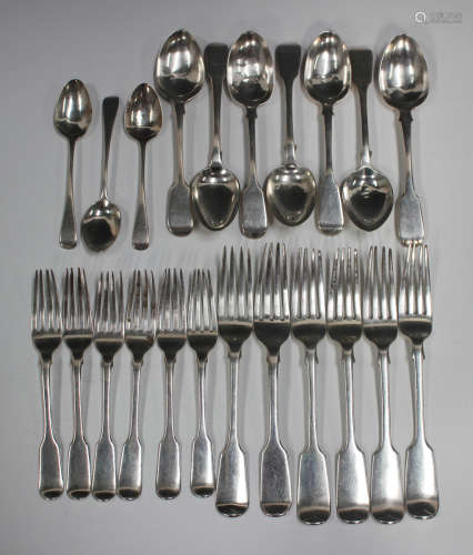 A George III and later part canteen of silver Fiddle pattern...