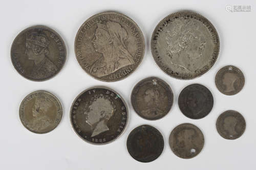 Nine British pre-decimal coins, including a George III crown...