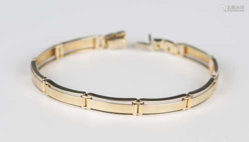 A two colour gold curved rectangular link bracelet with a sn...