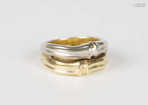 A two colour gold ring in an abstract design, detailed 'Ceta...