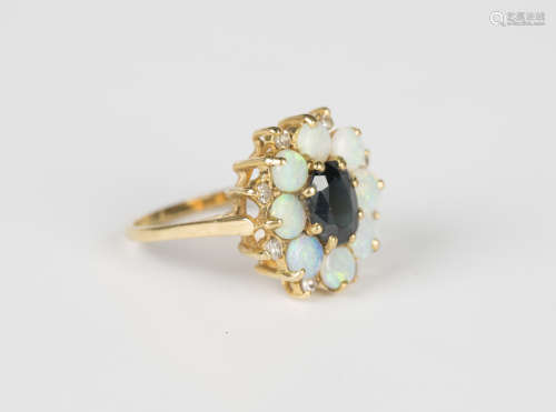 A gold, sapphire, opal and diamond oval cluster ring, claw s...