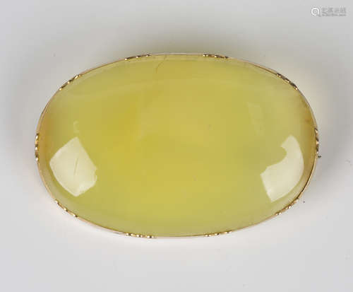 An early 19th century gold mounted oval dyed pale green agat...