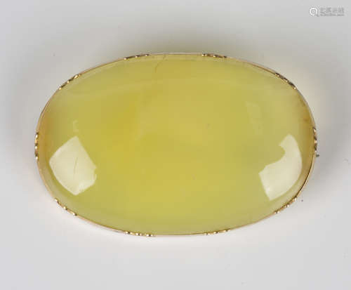 An early 19th century gold mounted oval dyed pale green agat...