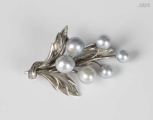 A silver and grey tinted cultured pearl brooch, designed as ...