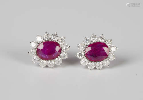 A pair of white gold, ruby and diamond cluster earstuds, eac...