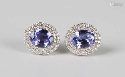 A pair of 18ct white gold, tanzanite and diamond cluster ear...