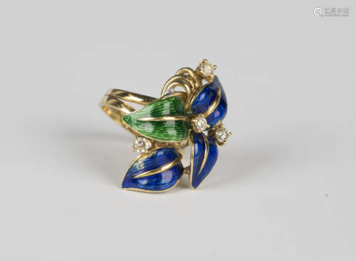 An 18ct gold, blue and green enamelled and diamond set ring ...