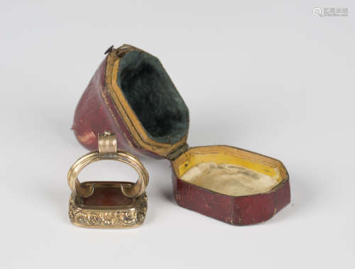An early 19th century gold cased base metal cornelian pendan...