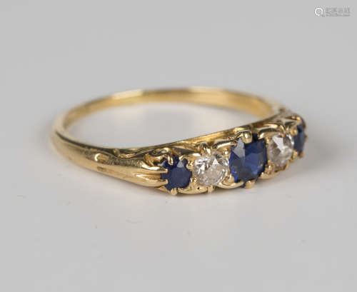 A gold, sapphire and diamond five stone ring, mounted with t...