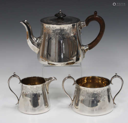 A late Victorian and later silver three-piece tea set, compr...