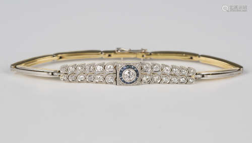 A diamond and sapphire bracelet in an Art Deco style, collet...
