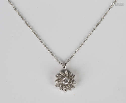 A diamond cluster pendant, mounted with the principal circul...