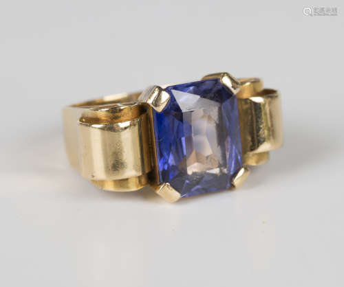 A gold ring, circa 1950, claw set with a cut cornered rectan...