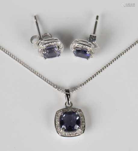 A white gold, iolite and diamond cluster pendant, detailed '...
