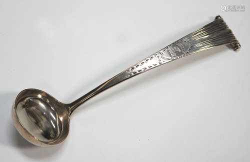 A George III Scottish silver scroll end sauce ladle, engrave...