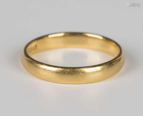 A 22ct gold wedding ring, Birmingham 1929, weight 3.7g, ring...