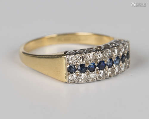 An 18ct gold ring, mounted with a row of eight circular cut ...