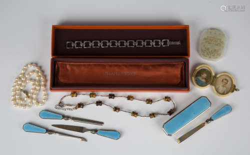 A silver and pale blue enamelled nail buffer, Birmingham 192...