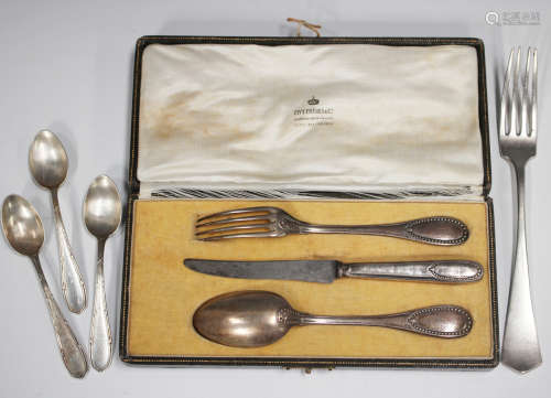 A French silver three-piece christening set, comprising fork...