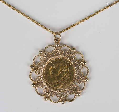 A Switzerland gold twenty francs coin in a pendant mount wit...