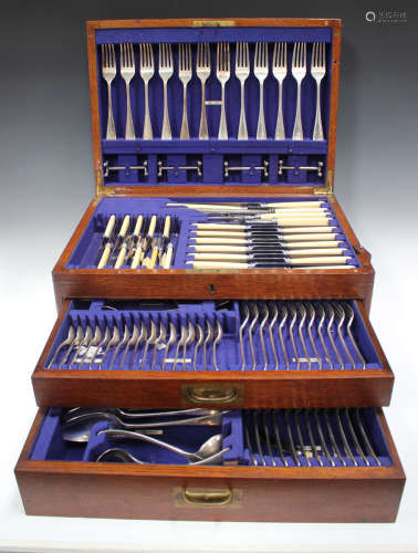 An Edwardian canteen of plated Old English pattern cutlery, ...