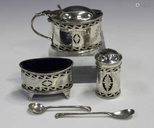 A George V silver three-piece condiment set, comprising oval...
