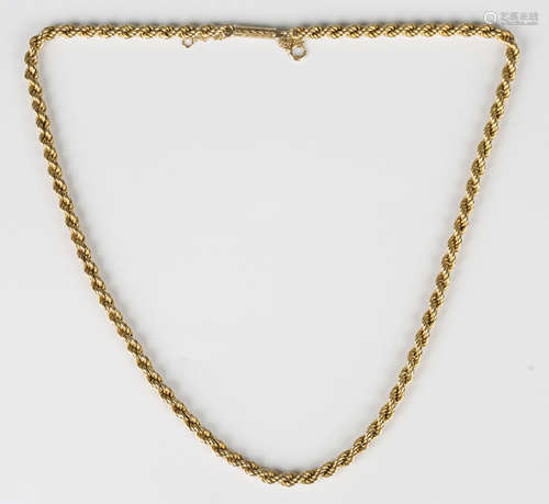 A gold ropetwist link necklace on a cylindrical clasp with e...