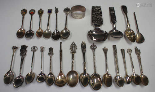 A small collection of silver items, including an oval napkin...