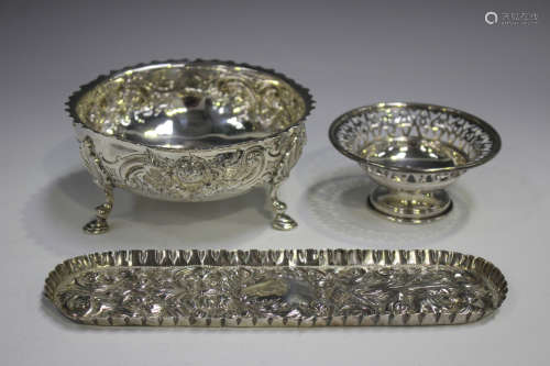 A Victorian silver circular sugar bowl with shaped rim, the ...