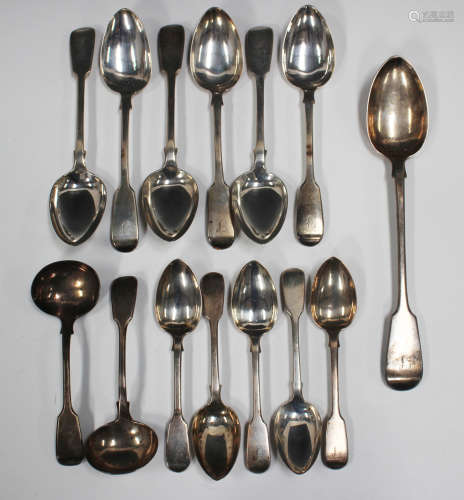 An early Victorian part canteen of silver Fiddle pattern cut...