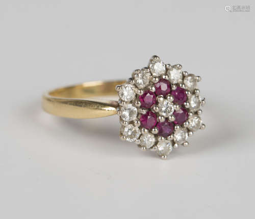An 18ct gold, diamond and ruby hexagonal cluster ring, mount...