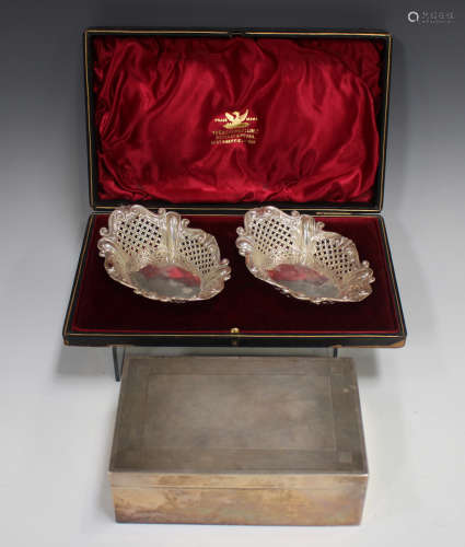 A pair of late Victorian silver shaped oval bonbon dishes wi...