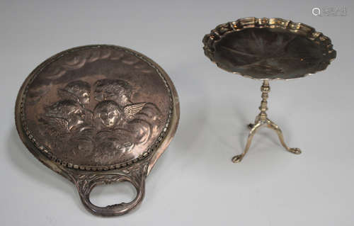 A George V silver novelty dish, modelled as a tripod wine ta...