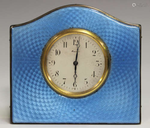 An Art Deco silver and pale blue enamelled bedside timepiece...