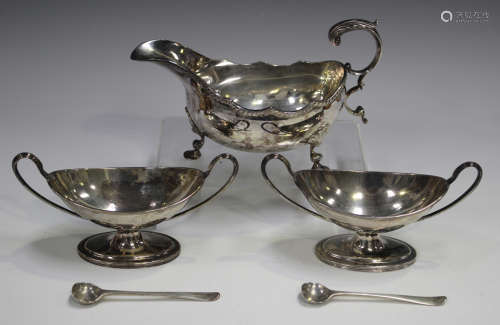 A pair of Victorian silver table salts, each of oval boat sh...