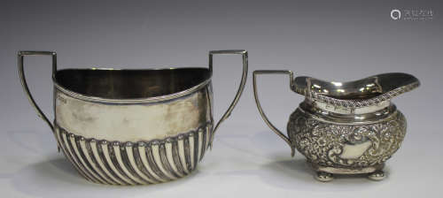 A late Victorian silver two-handled sugar bowl of half-reede...