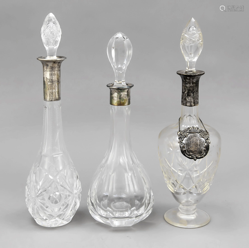 Three carafes with silver neck