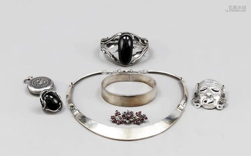 Seven pieces of silver jewelry