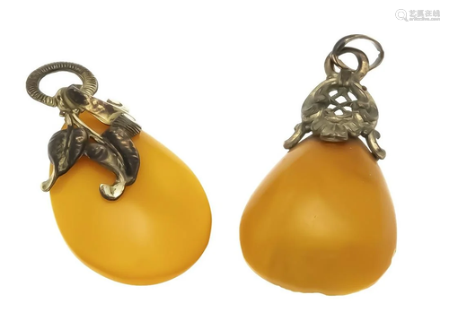 2 antique amber pendants with