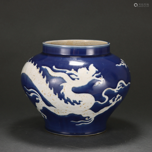 A Blue and White Reserve Decorated Dragon Jar Ming