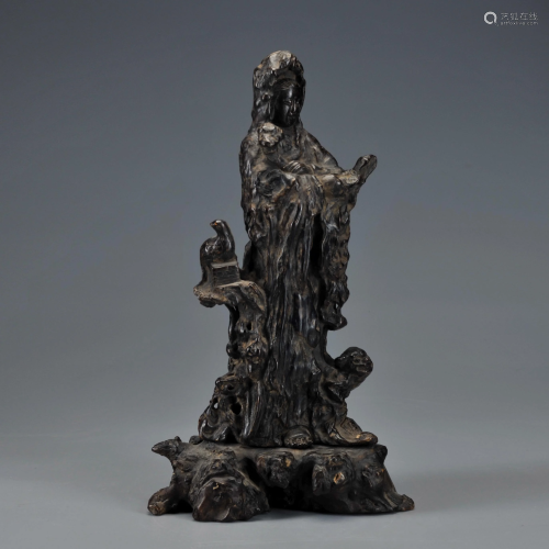A Carved Aloeswood Standing Figure Qing Dynasty