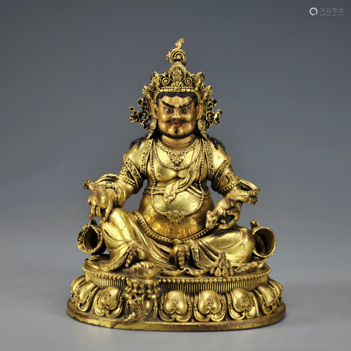 A Tibetan Gilt-bronze Seated Jambhala