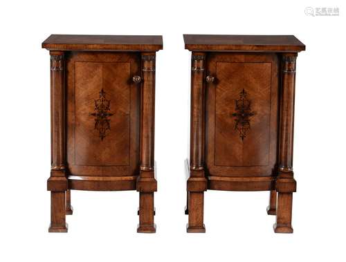 Y A pair of French walnut and ebony inlaid bedside cabinets