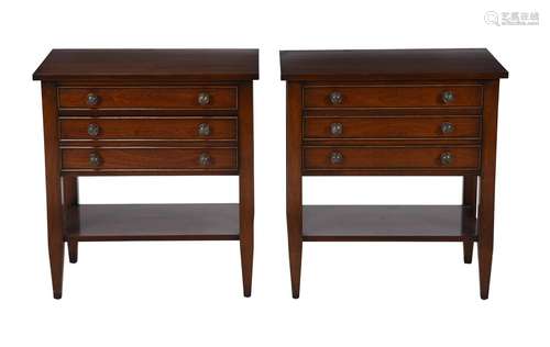 A pair of hardwood bedside tables