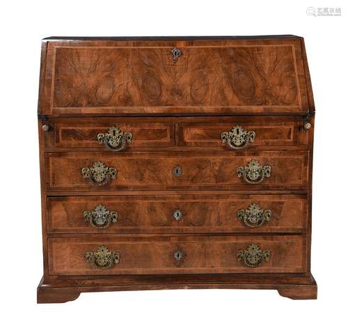 A Continental walnut and inlaid bureau