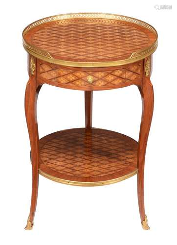 A French walnut and parquetry inlaid circular occasional tab...