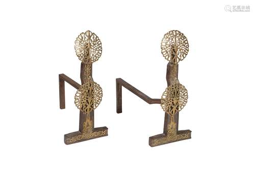 A pair of Arts and Crafts cast iron and brass mounted andiro...